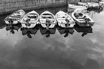 Bullock Harbour Boats Reflection by Pat Divilly