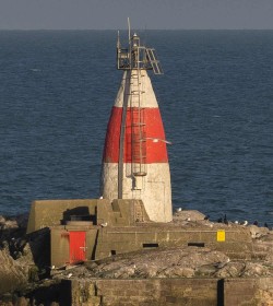 Muglins Lighthouse by Gerry Moloney