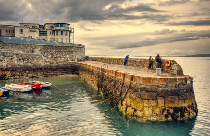 Fishing Coliemore Harbour by George Jackson