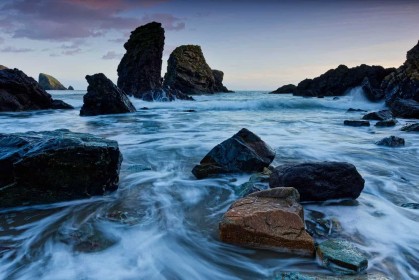 Ballydwan Sea Stacks - Sunset by Jean Clarke
